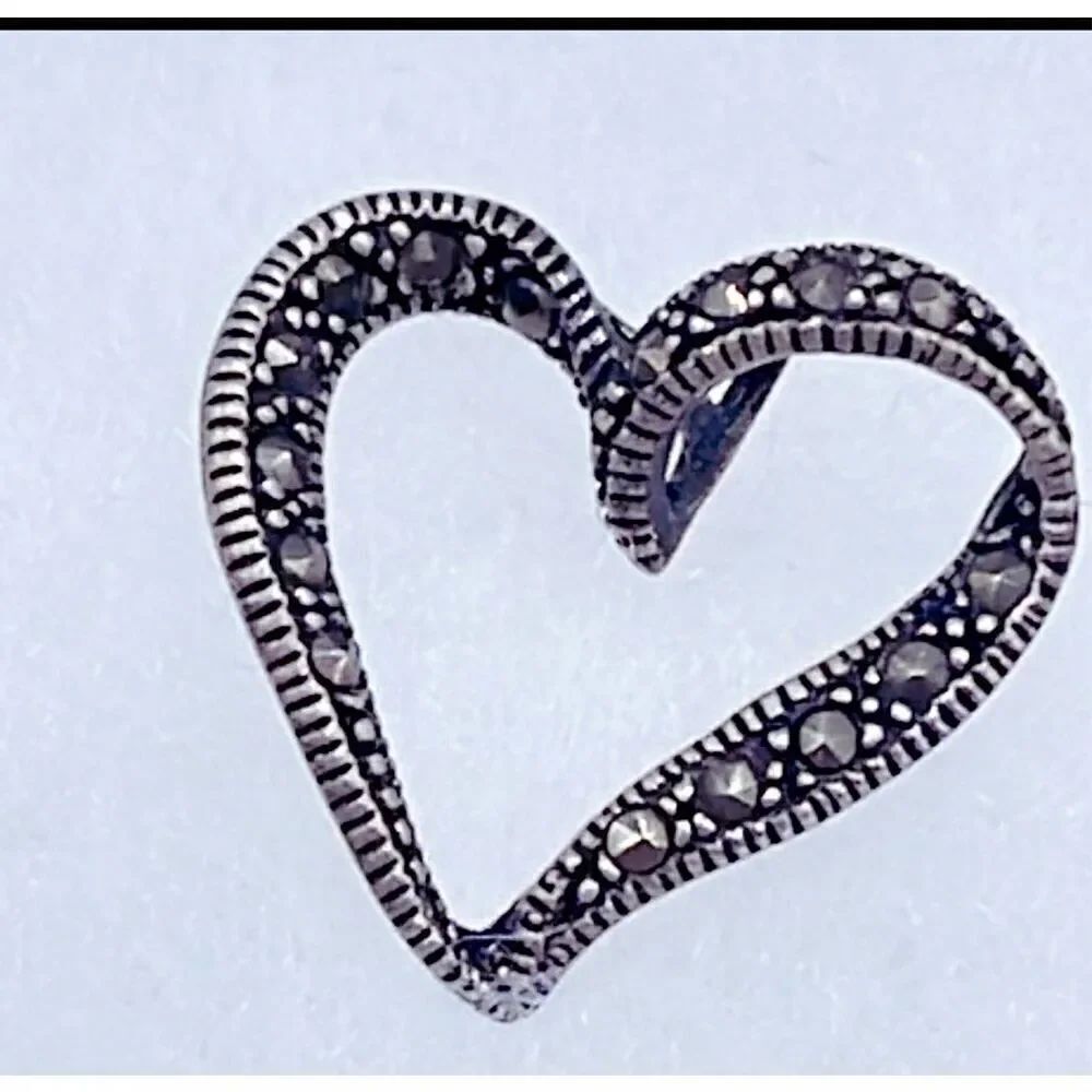 Vintage estate sale sterling silver Marcasite heart sliding pendant.
